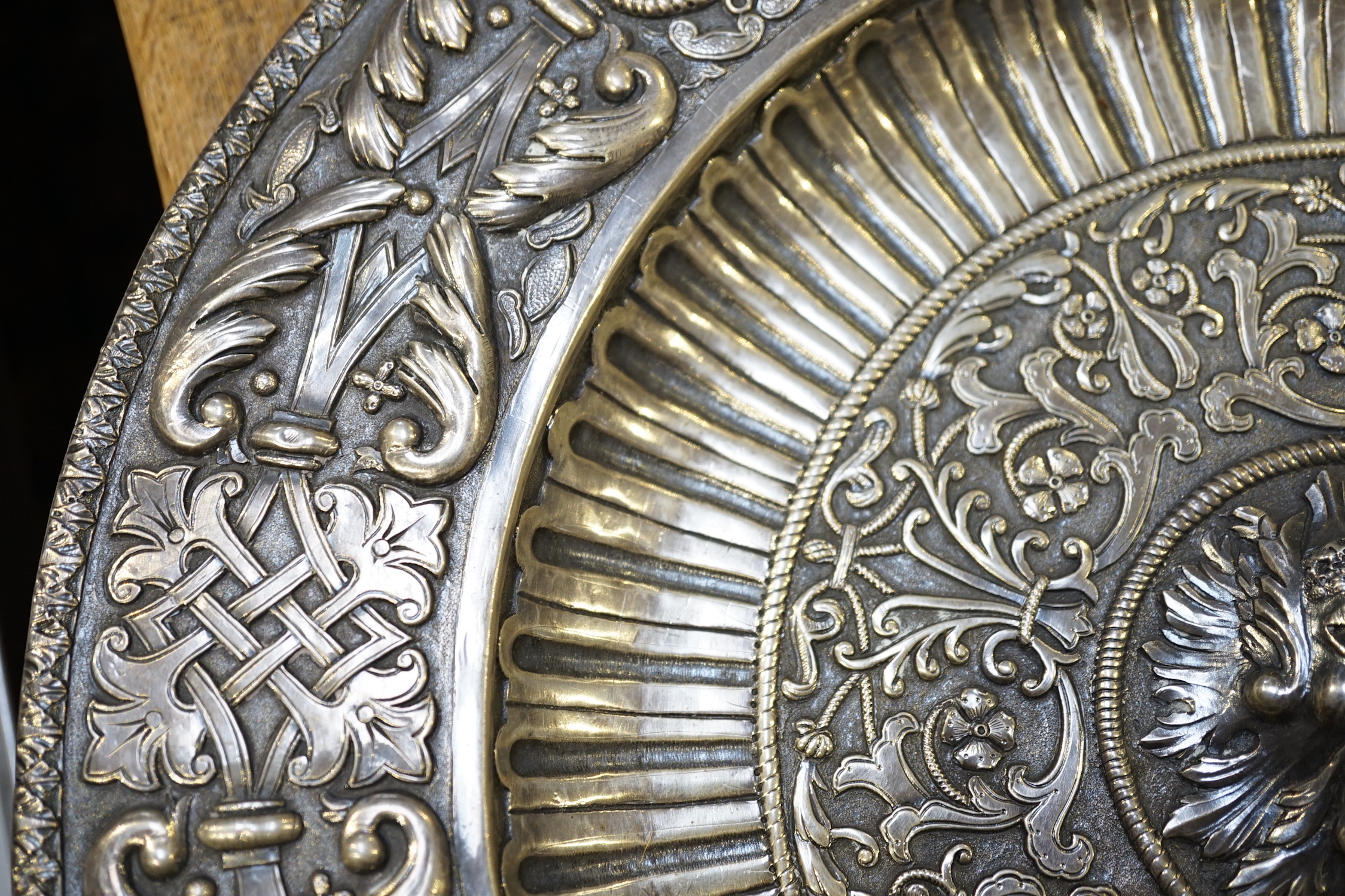 A 20th century Portuguese/Spanish embossed silver charger